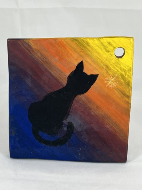 Black Cat Watching Sunset